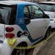 Car2Go Smart car rentals parked on the streets of Amsterdam in 2013.